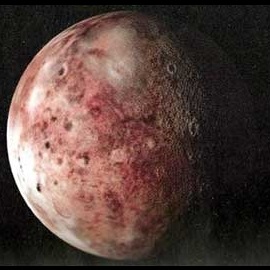 Плутонова луна Харон (цветной снимок)